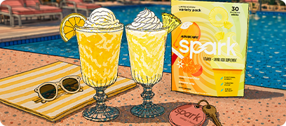 Cell shaded image of Spark Orange Cream & Pineapple Whip Variety pack next to an Orange Cream Float drink and a Pineapple Whip drink in glasses next to a resort style swimming pool.