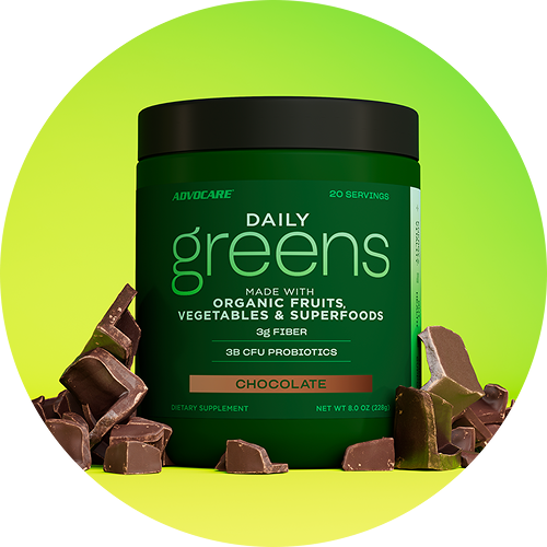 Daily Greens Chocolate Canister next to chocolate pieces.