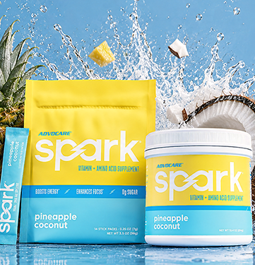 Spark Pineapple Coconut canister and stick pack next to a pineapple and a sliced coconut on a blue background.