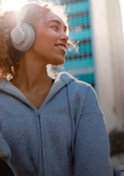 Wellness - Woman listening to headphones